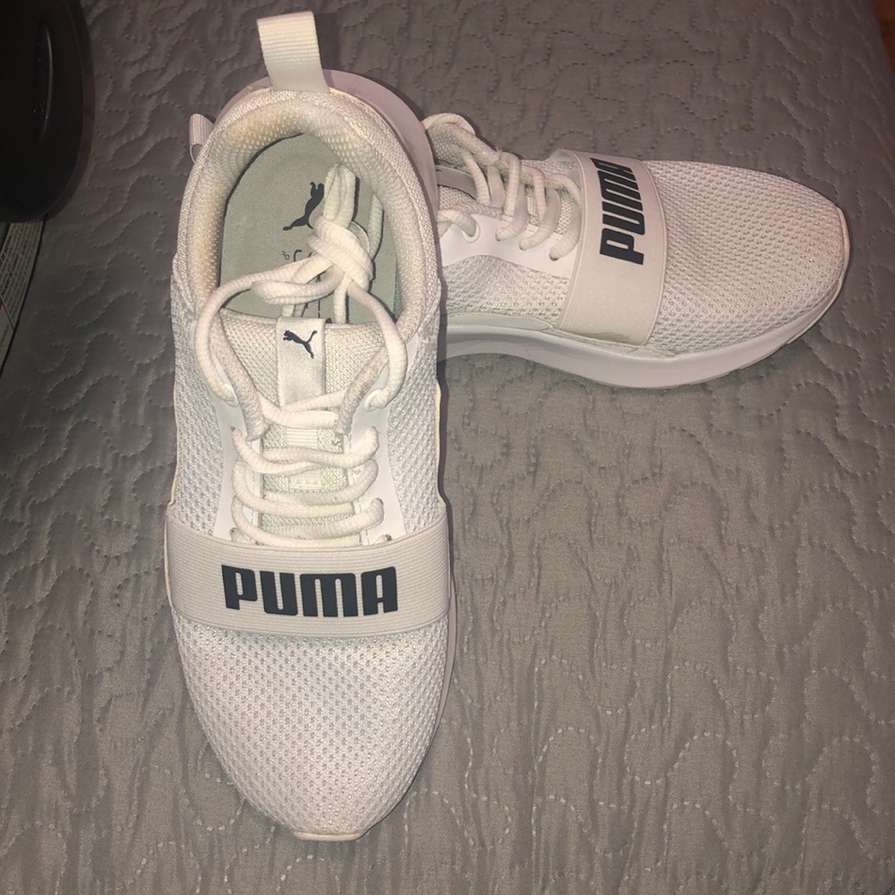 White and black soft foam puma